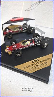 1/43 Quartzo Lotus 49B Gold Leaf, 1968 US Grand Prix signed by Mario Andretti