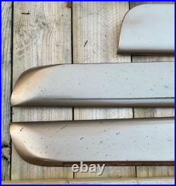 97-03 Pontiac Grand Prix sedan lower door trim molding L&R Set Topaz Gold