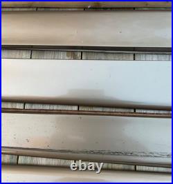 97-03 Pontiac Grand Prix sedan lower door trim molding L&R Set Topaz Gold