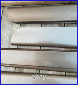 97-03 Pontiac Grand Prix sedan lower door trim molding L&R Set Topaz Gold