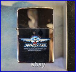 Formula One Zippo's, US Grand Prix 2001 and 2002, plus 2000 Keyring