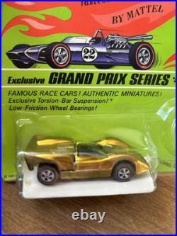 Hot Wheels Grand Prix Series McLaren M6A Gold Button Missing